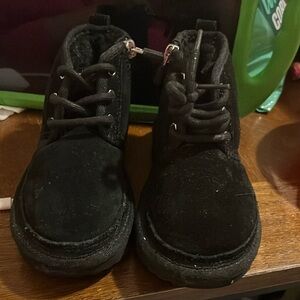 Black girl Ugg boots zipper on the inside of the boots